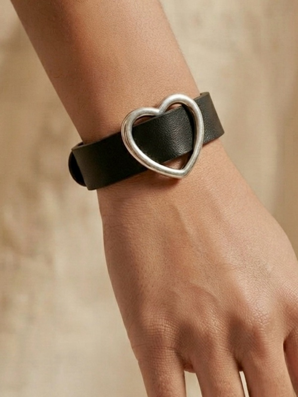 leather like heart  bracelet.